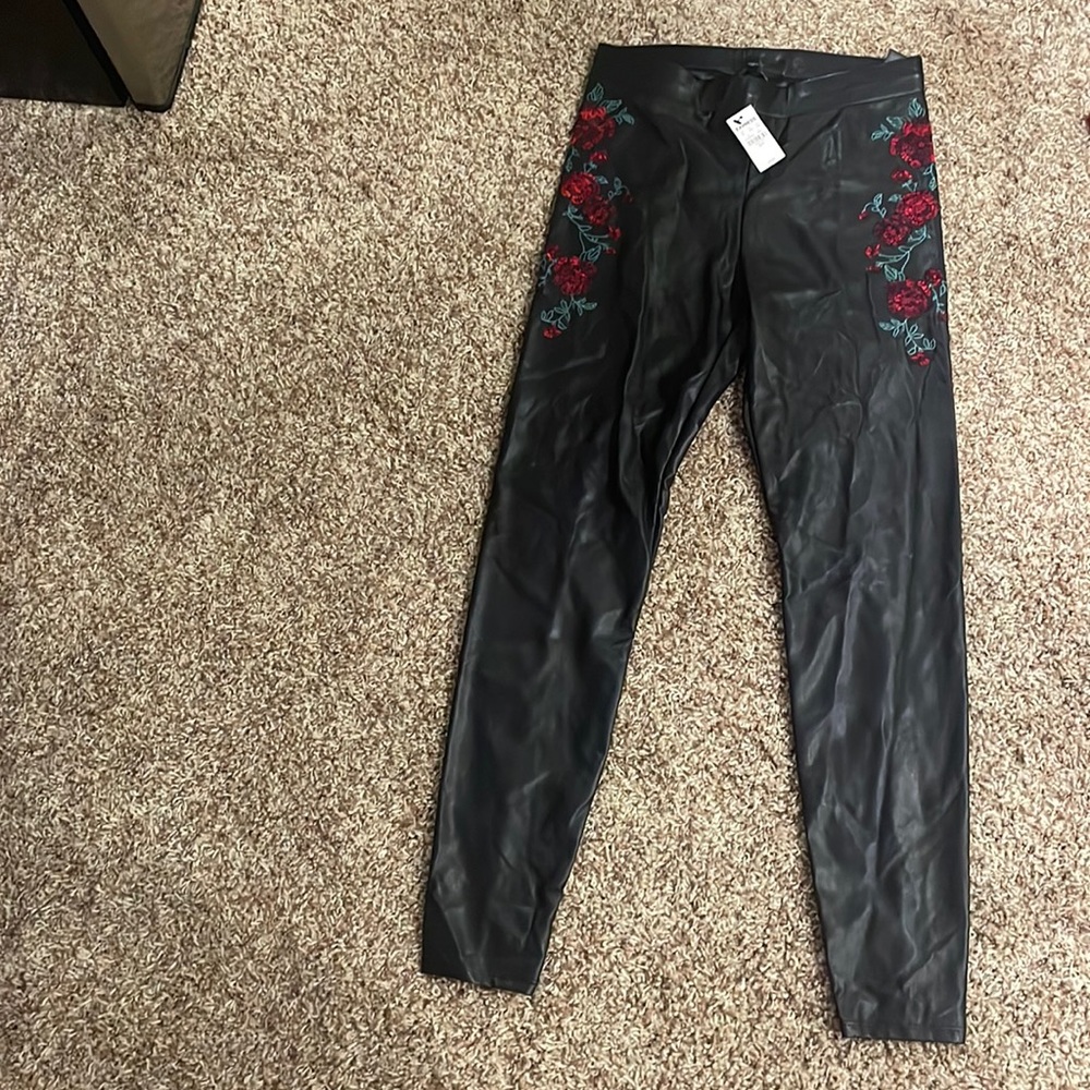 Express size small black leather leggings with red floral sides